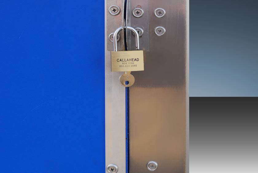 DOOR’S EXTERIOR HAS TWO STAINLESS STEEL PADLOCK HASPS TO LOCK ON THE OUTSIDE