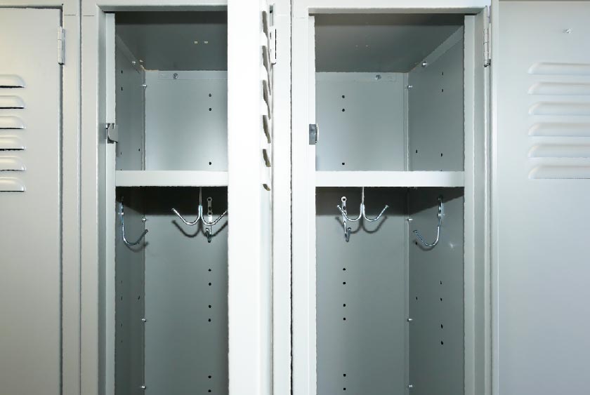 A25 LOCKER ROOM HAS FOUR STEEL LOCKERS WITH STURDY STEEL DOORS
