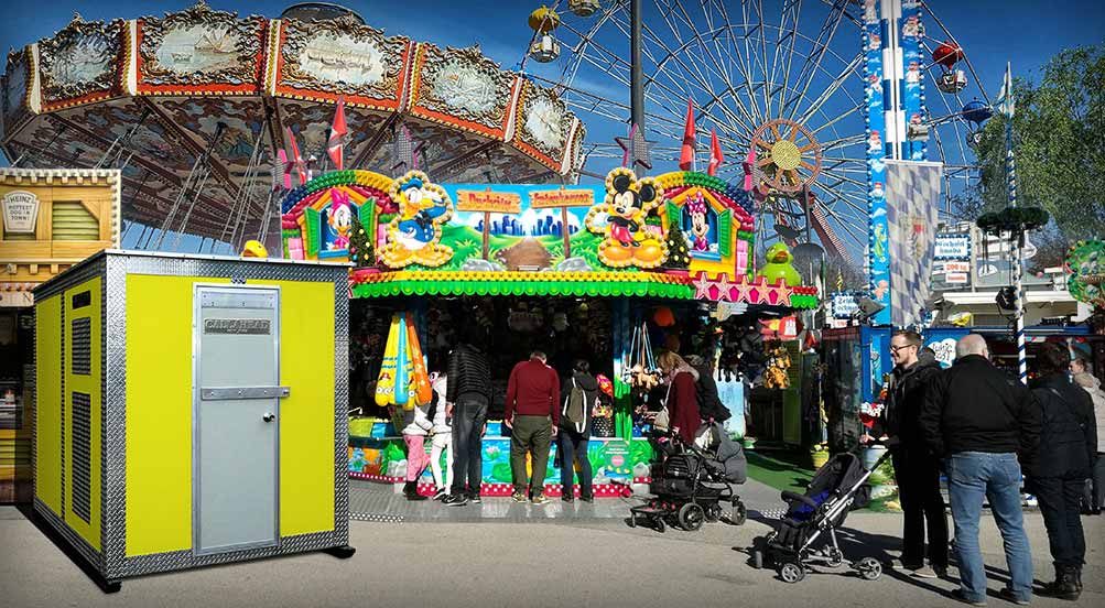 A YELLOW COLORED A48 STORAGE SHED IN USE AT AN AMUSEMENT PARK