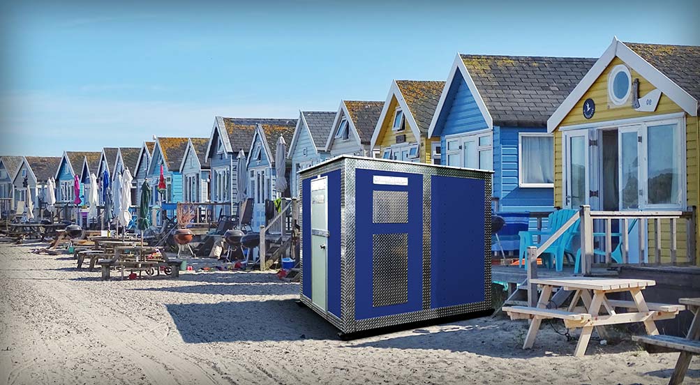 A BLUE A48 STORAGE SHED IN USE NEAR BEACH BUNGALOWS IN THE SUMMER