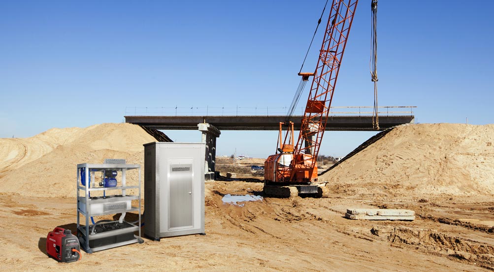 Water & Sewer Tower | Water & Sewer Tower Outside at a Remote Construction Site