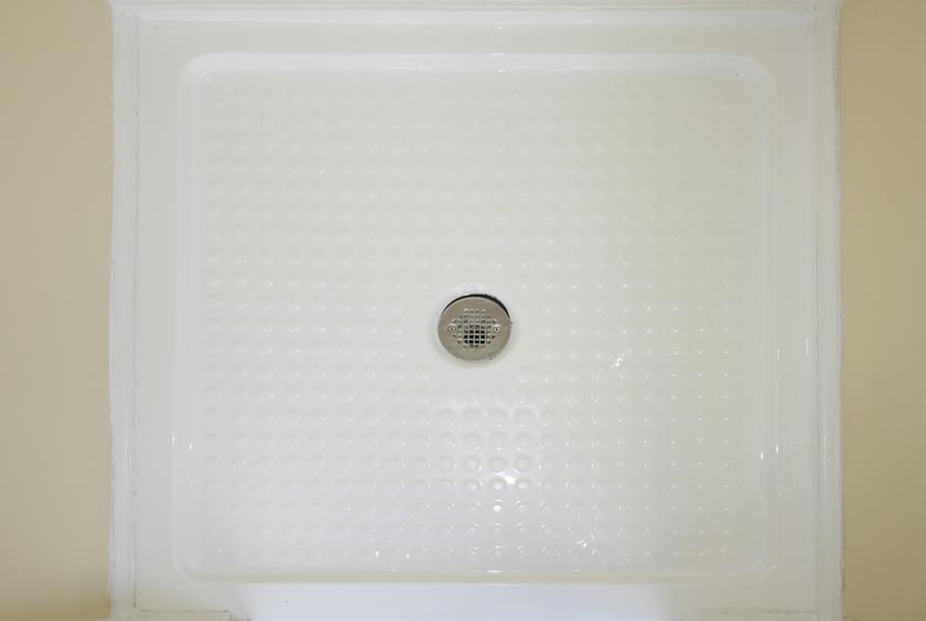 SHOWER STALL BASE IS A SPACIOUS 33X33 INCHES