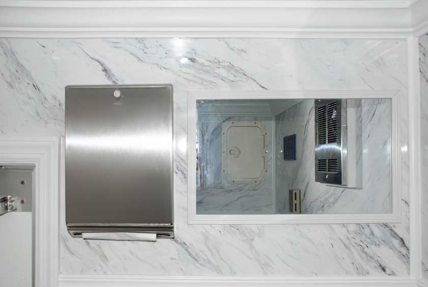 VANITY MIRROR AND PAPER TOWEL DISPENSER