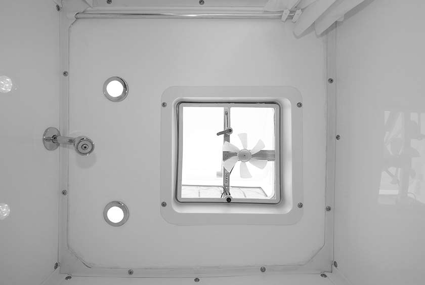 LIGHTED SHOWER AREA WITH VENT OVER SHOWER ENCLOSURE