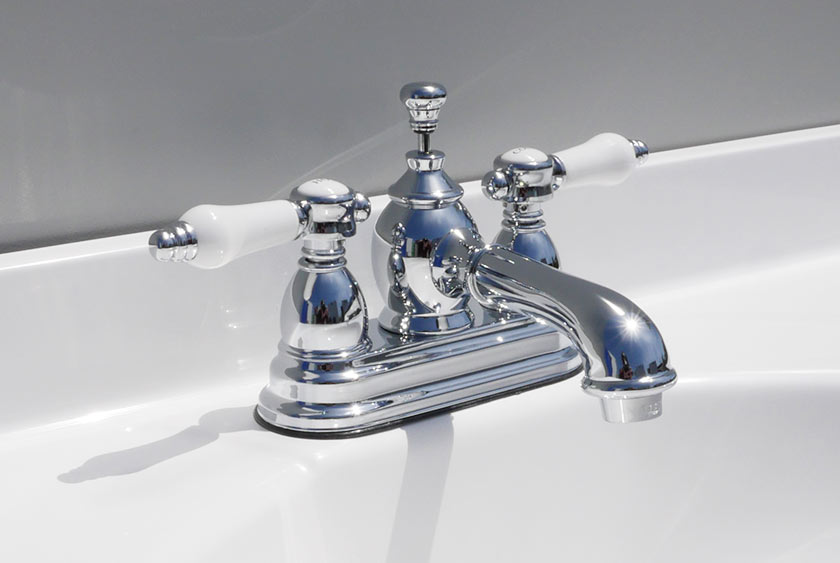Dual handle chrome plated brass faucet.