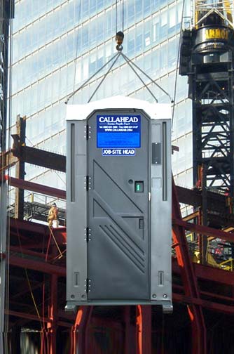 The Cable Head Portable Toilet Lifted By Crane