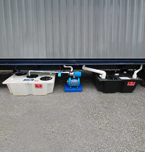 Porcelain Toilet System Under Trailer