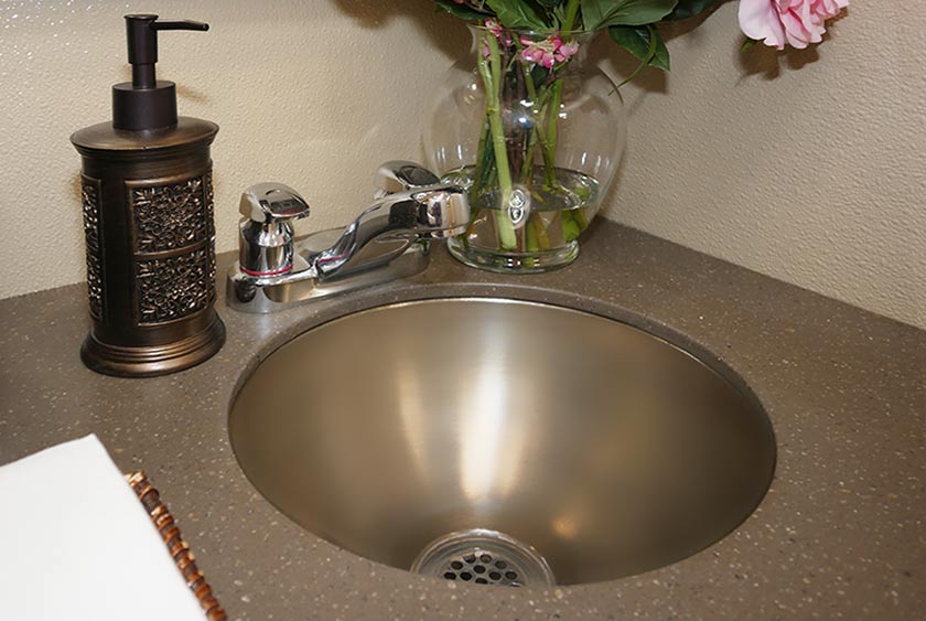 THREE STAINLESS STEEL HAND WASHING SINK BASINS PROVIDE HOT AND COLD RUNNING WATER OPTIONS