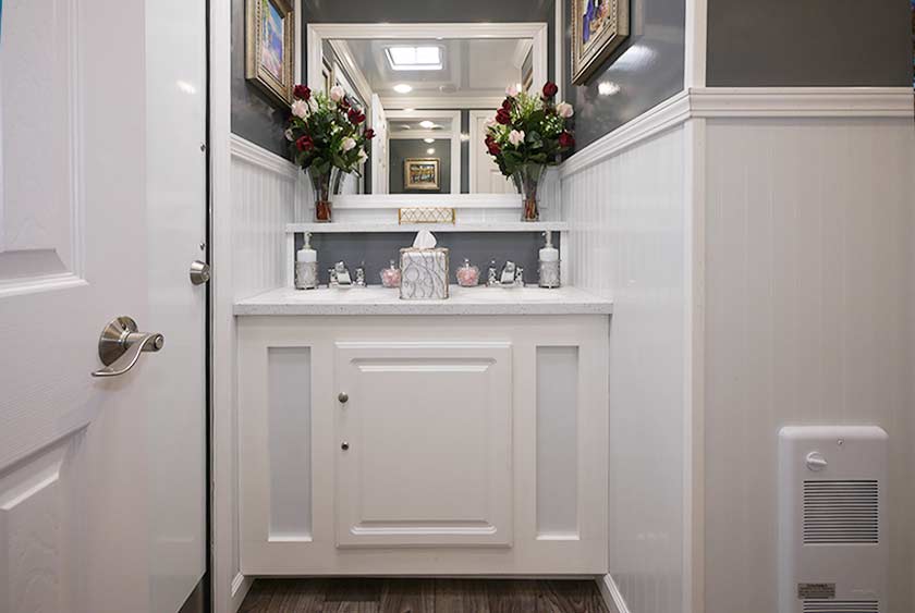 LUXURIOUS VANITY AREA ON WOMEN'S SIDE OF THE EAST END RESTROOM TRAILER 