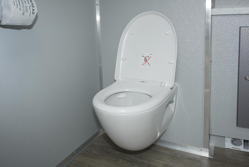 FULL SIZED PORCELAIN TOILET