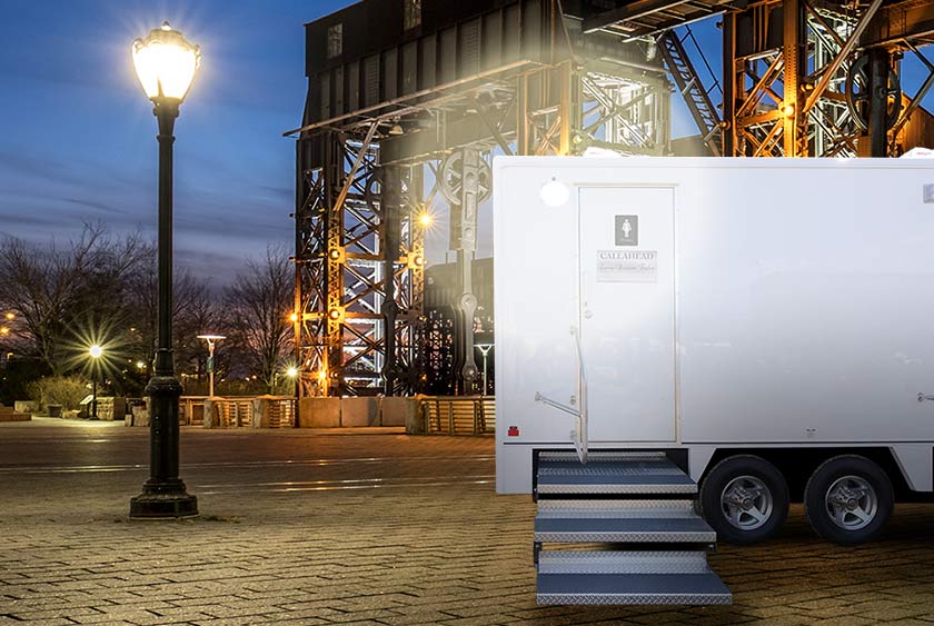 OUTDOOR LIGHTING COMPLIMENTS THE WIDE STAIRCASES AND STAINLESS STEEL HANDRAILS