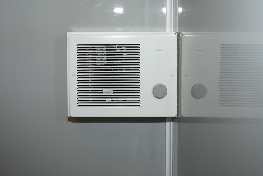 THERMOSTAT CONTROLLED FAN FORCED HEATER
