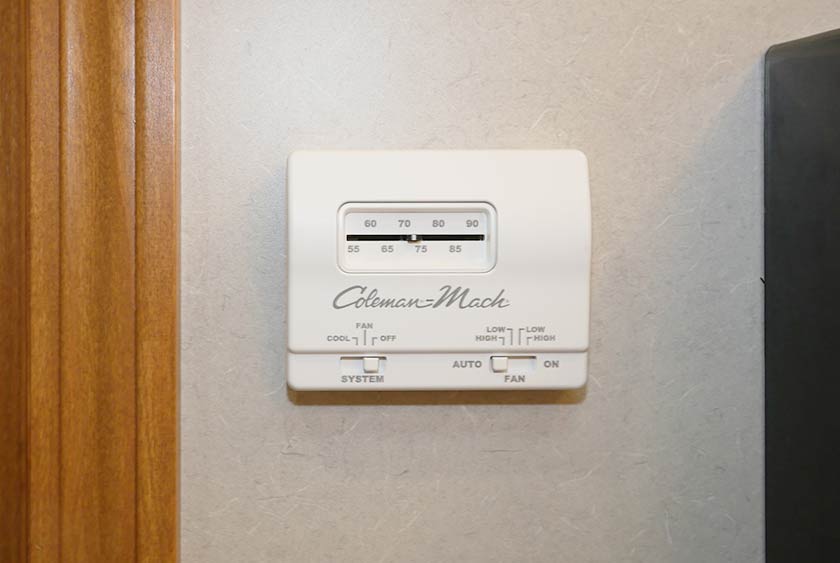 THERMOSTAT CONTROLLED AIR CONDITIONING FOR YEAR ROUND COMFORT
