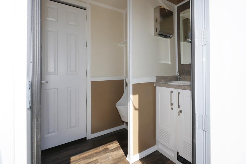 ENTRANCE TO MEN'S SIDE OF THE ROVER RESTROOM TRAILER