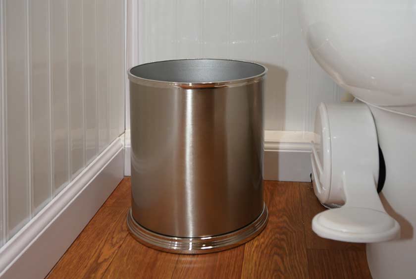 SOLID STEEL WASTE BASKETS IN STALLS
