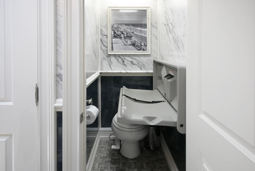 BABY CHANGING STATION WITHIN WOMEN'S SIDE