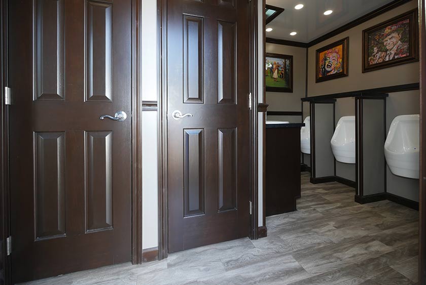 THE MEN'S SIDE OF THE BEDFORD PARK HAS TWO PRIVATE STALLS AND FOUR URINALS