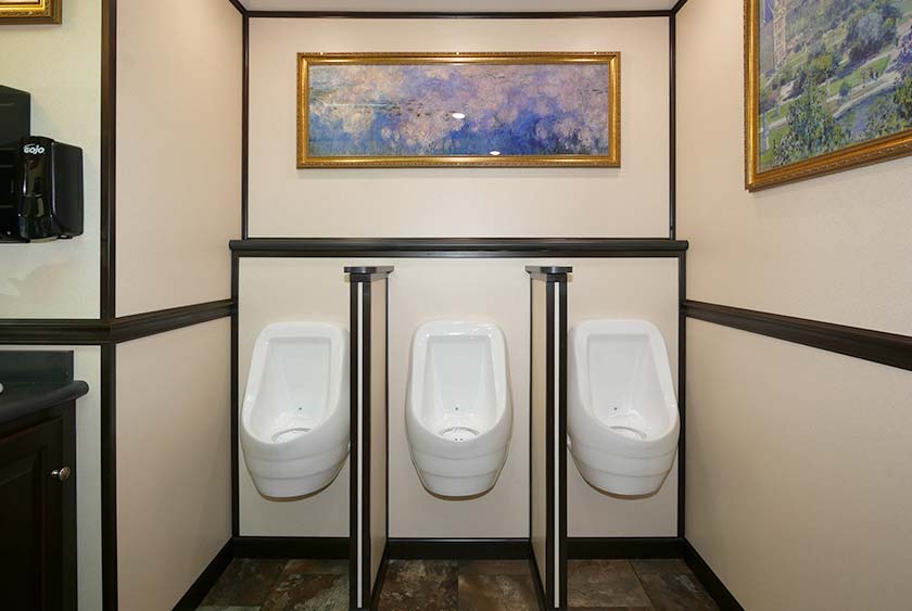 THREE PORCELAIN, ODORLESS URINALS ON MEN'S SIDE