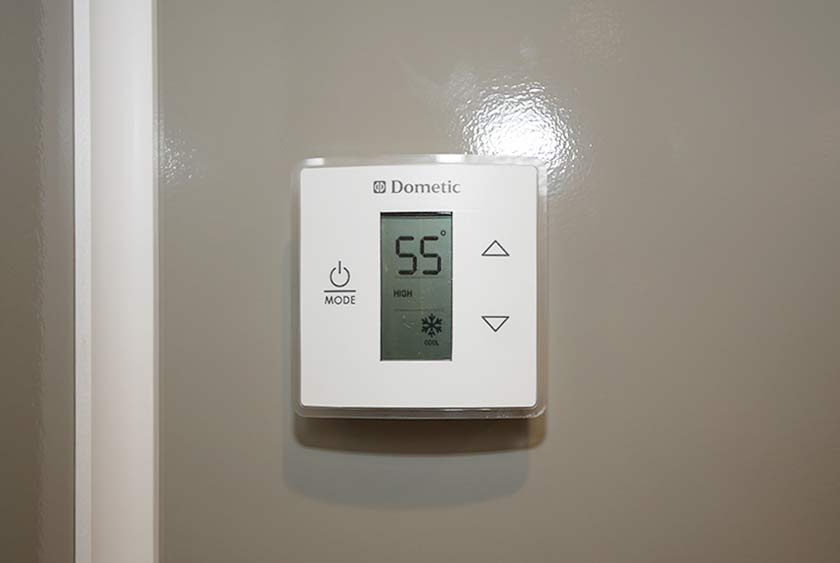 THERMOSTAT CONTROLLED AIR CONDITIONING