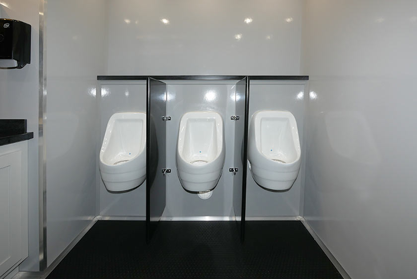 THREE PORCELAIN URINALS FOR MEN