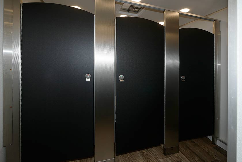 FOUR PRIVATE BATHROOM STALLS ON WOMEN'S SIDE, ONE ON MEN'S SIDE