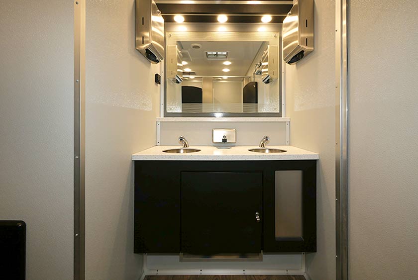 WIDE VANITY WITH DOUBLE SINKS ON WOMEN'S SIDE