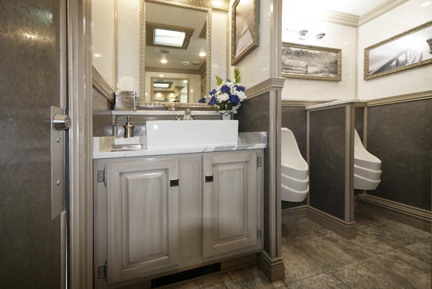 FOYER ON MEN'S SIDE WITH SINK VANITY AND MIRROR
