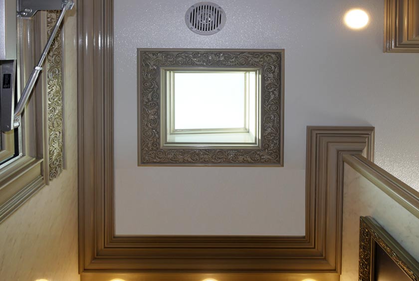 SKYLIGHT SHOWN WITH WOOD TRIM DETAIL INCLUDING CROWN MOLDING