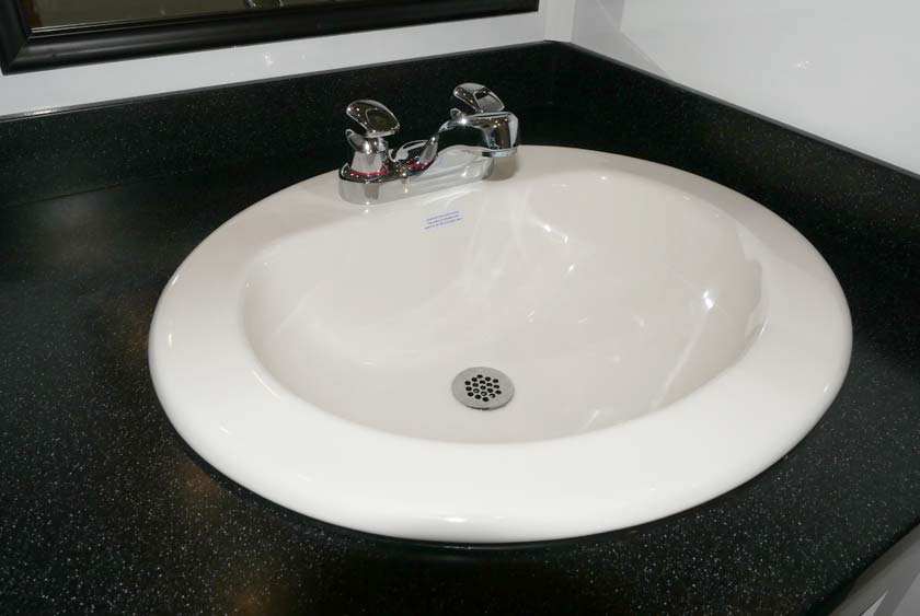LARGE PORCELAIN SINKS WITH AUTOMATIC SHUTOFF FAUCETS