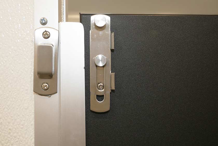 BATHROOM STALLS HAVE A DOUBLE LOCK FOR ADDITIONAL PRIVACY