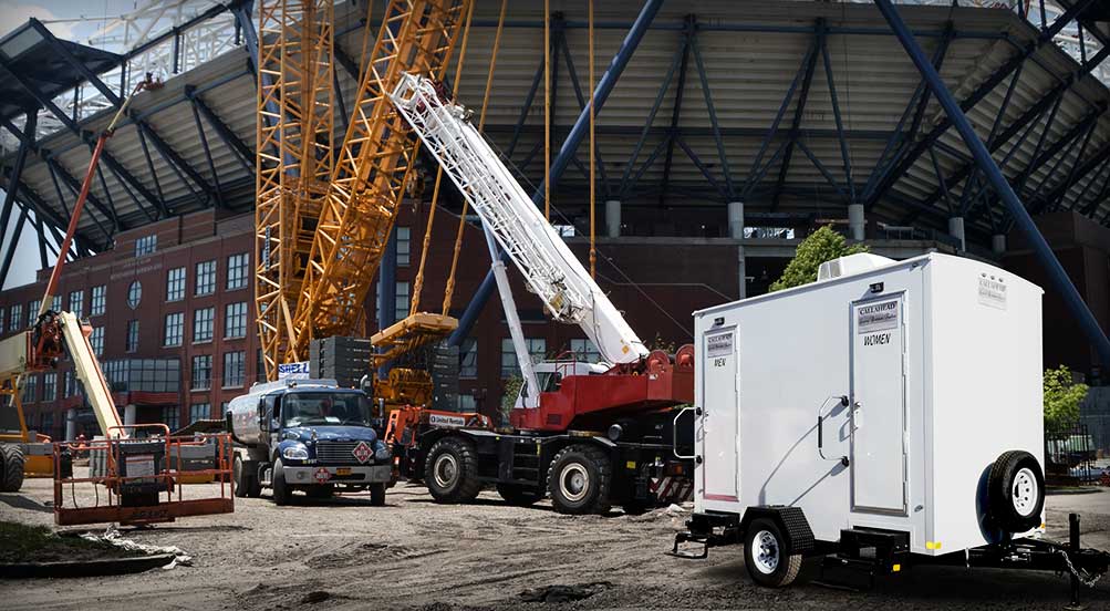 The Job Site 80 Restroom Trailer Near Stadium Construction