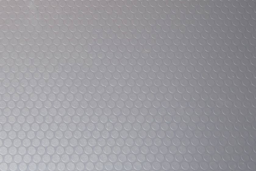 NON-SKID RUBBER COIN FLOORING THROUGHOUT