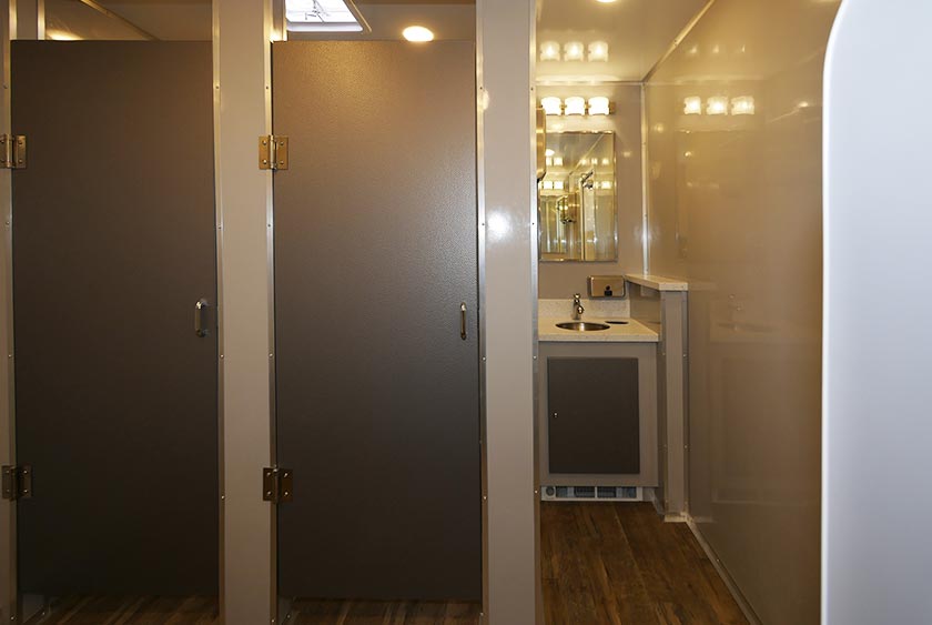 MEN'S SIDE, VANITY SINK WITH 2 TOILET STALLS