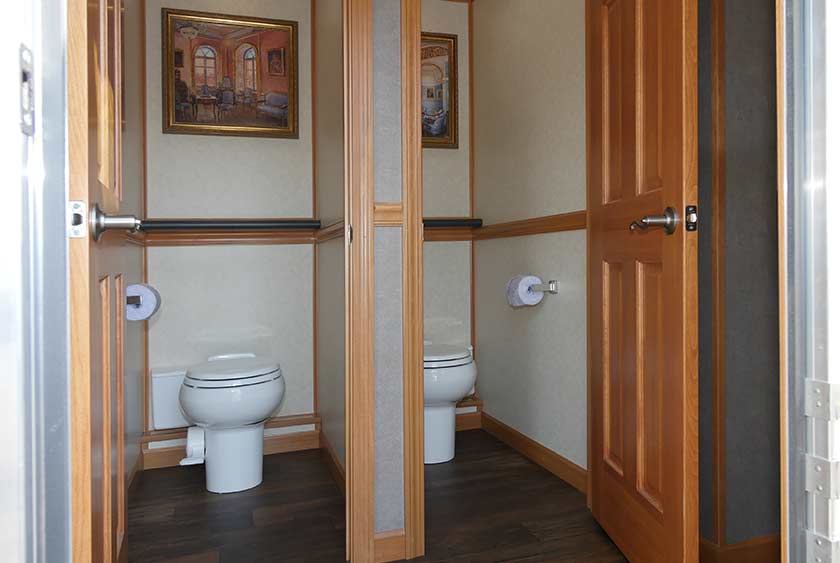 ROOMY STALLS WITH FLOOR TO CEILING LOCKING DOORS