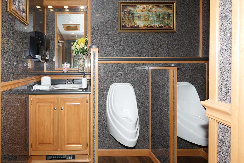 THE NORTH SHORE RESTROOM TRAILER FOYER ON MEN'S SIDE