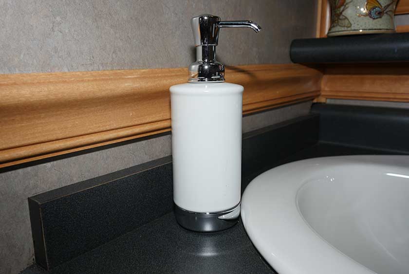 AMENITIES INCLUDED, SUCH AS: PUMP SOAP DISPENSERS, FLORAL ARRANGEMENTS, FILLED CANDY DISHES