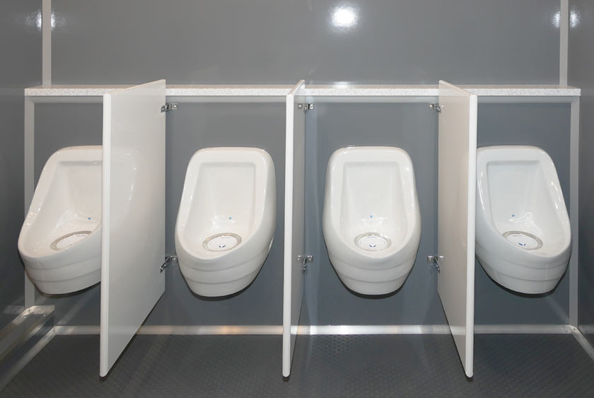 FOUR SLOAN ODORLESS, WATERLESS URINALS