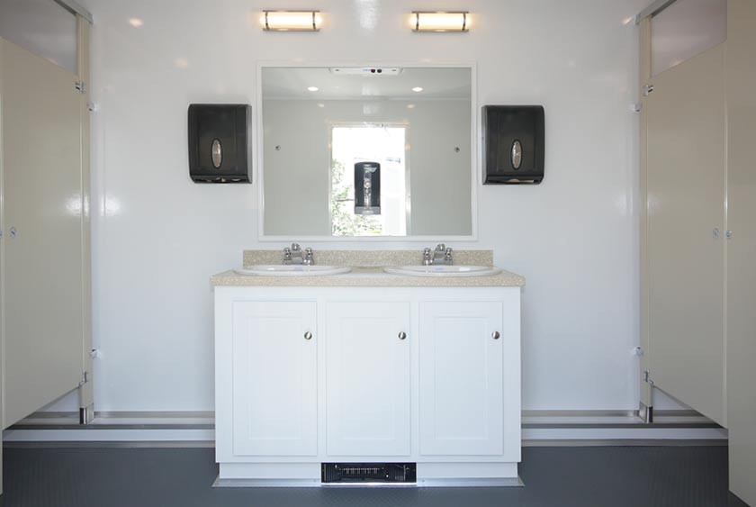 VANITIES HAVE TOE-KICK HEATERS THAT WARM THE ENTIRE RESTROOM