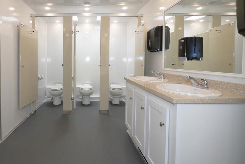 SIX LOCKING PRIVATE STALLS ON THE WOMEN'S SIDE