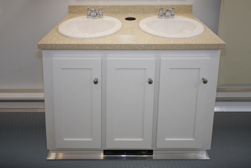 VANITIES HAVE DOUBLE SINKS AND STORAGE AREA BELOW