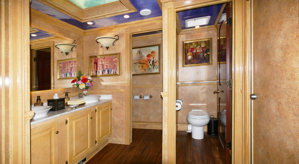 The Versailles Restroom Trailer Has Five Stalls and Has Two Sinks
