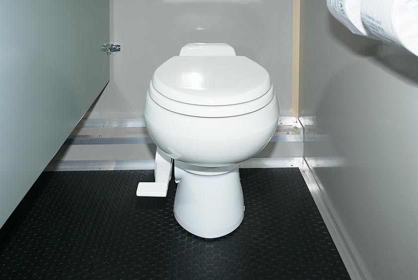 FULL SIZED PORCELAIN TOILETS WITH CONVENIENT FOOT PEDAL FLUSH