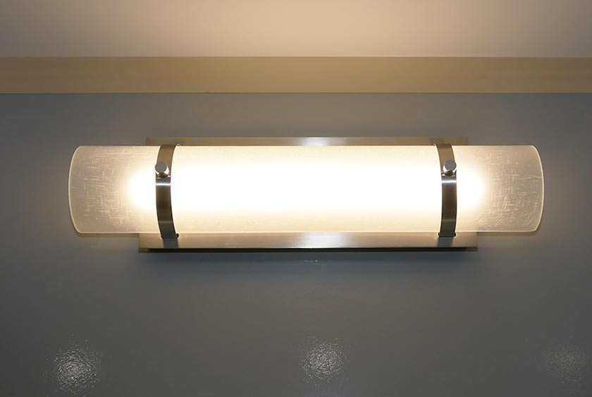 WALL SCONCE LIGHTING ABOVE MIRRORS, IN ADDITION TO CEILING LED LIGHTING