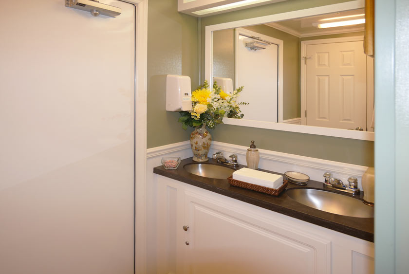 LARGE DOUBLE SINK VANITY IN WOMEN'S RESTROOM