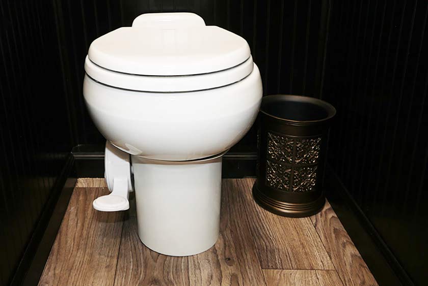 FULL SIZED PORCELAIN TOILETS WITH CONVENIENT FOOT-PEDAL FLUSH
