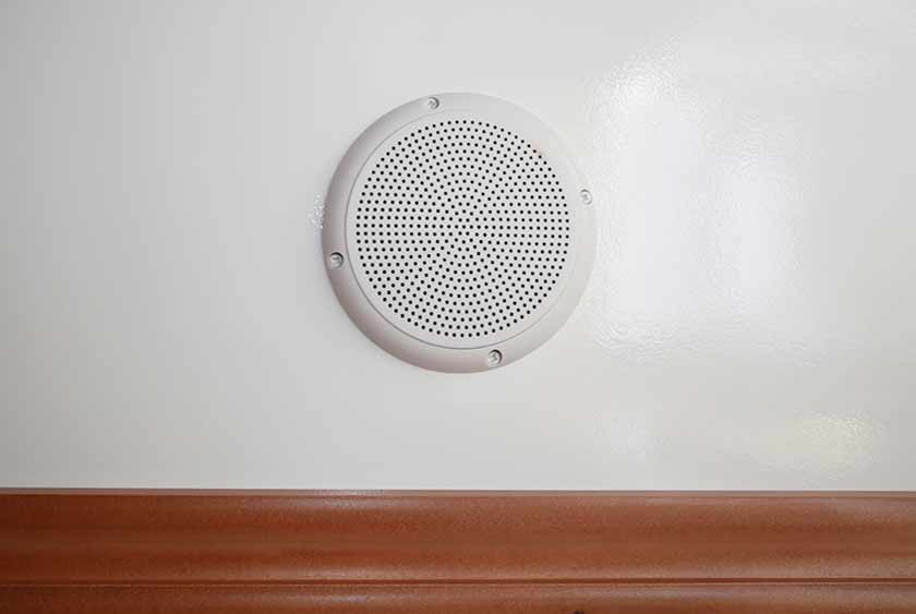 BUILT IN AM/FM STEREO AND CD PLAYER WITH CEILING MOUNT SPEAKERS