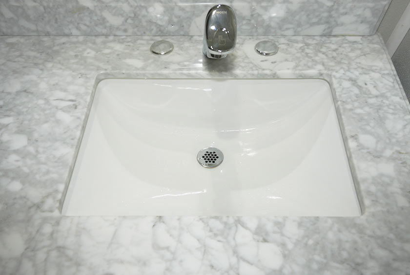 CONVENIENCE SHELF OVER MEN'S URINAL