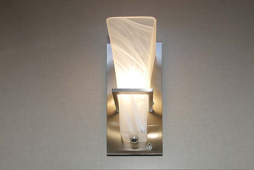 BEAUTIFUL WALL SCONCE LIGHTING IN EVERY BATHROOM STALL