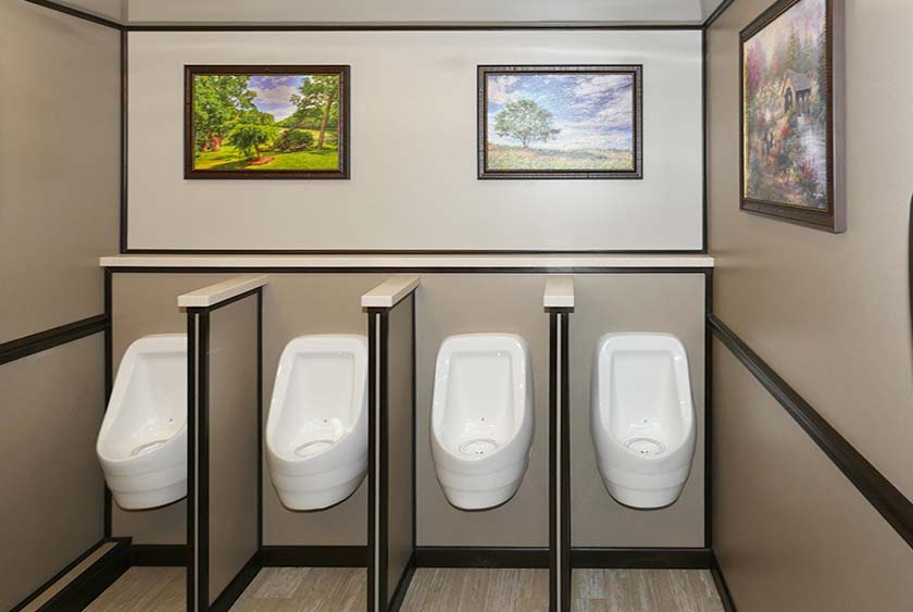 FOUR SLOAN PORCELAIN URINALS