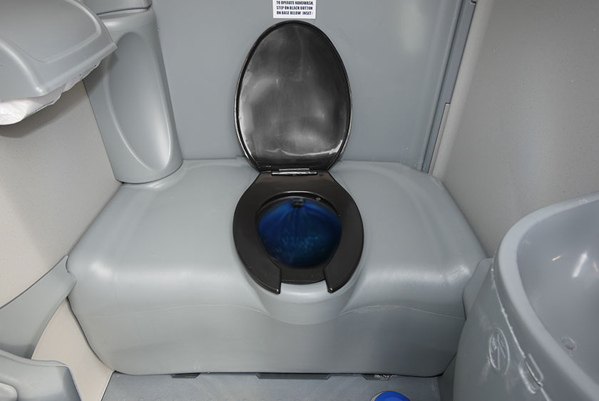 LARGE COMFORTABLE INTERIOR WITH FULL SIZED TOILET SEAT